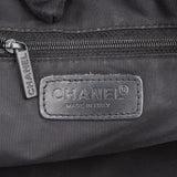 Chanel Travel Line Monogram Handbag