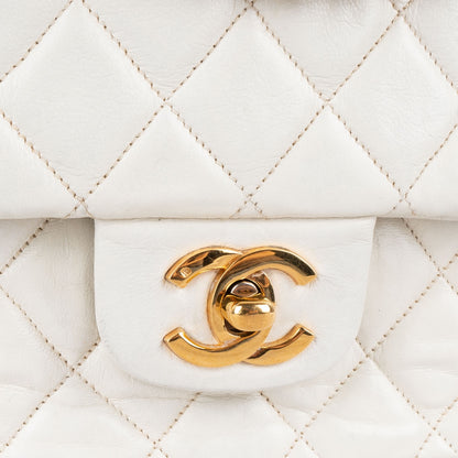 Chanel Quilted Lambskin 24K Double Flap Bag