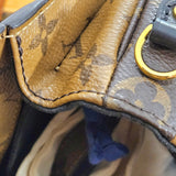Louis Vuitton Monogram Reverse Canvas Pochette Métis Handbag