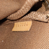 Louis Vuitton Canvas Monogram Pochette Mini Handbag